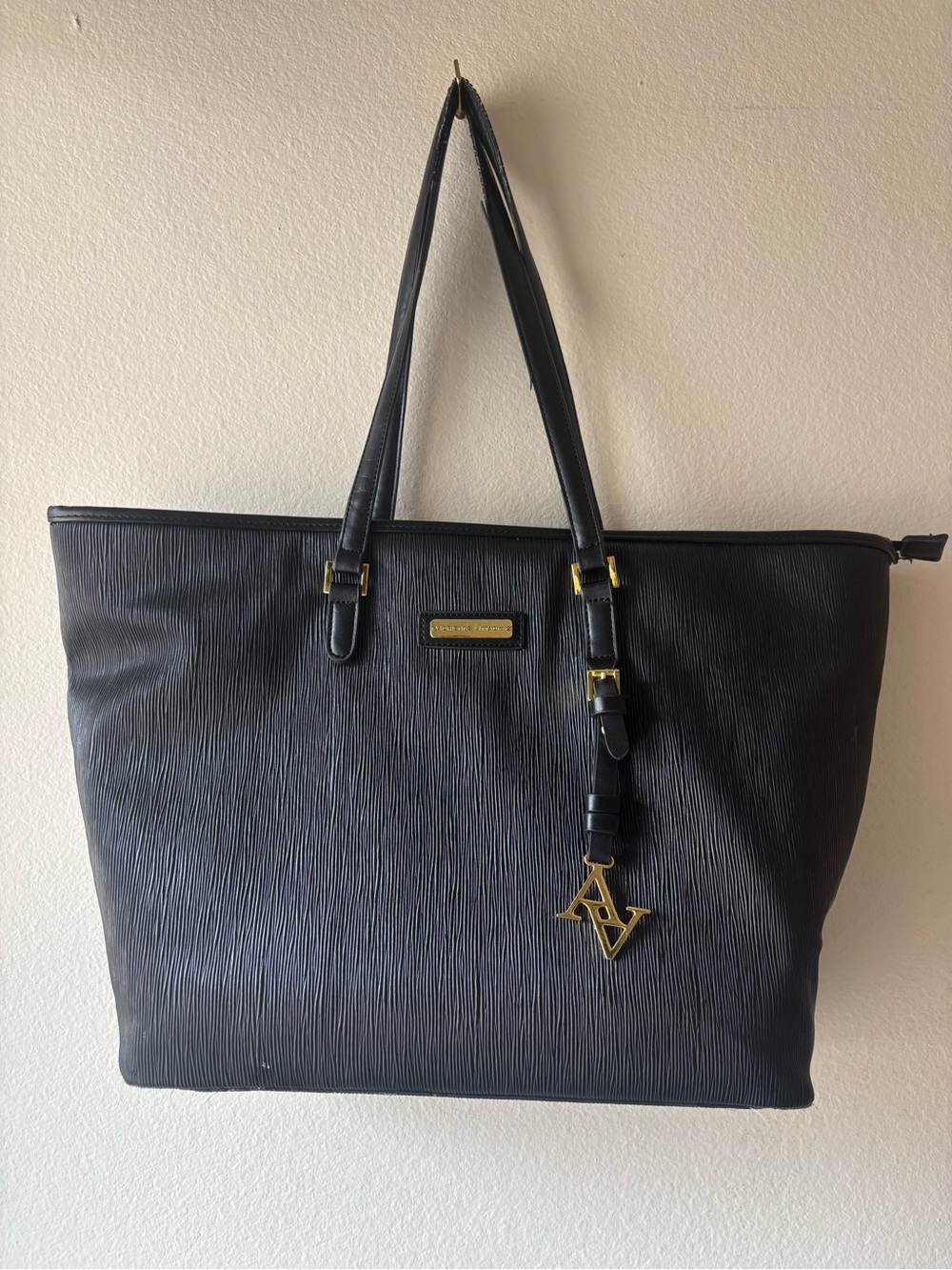 Adrienne Vittadini black tote bag with vertical ribbed texture